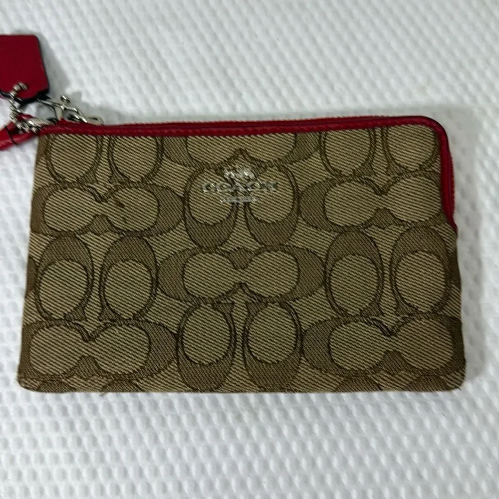Coach tan and red Wristlet with Logo Pattern